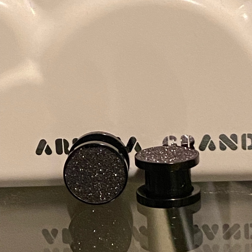 Plugs for stretched piercings